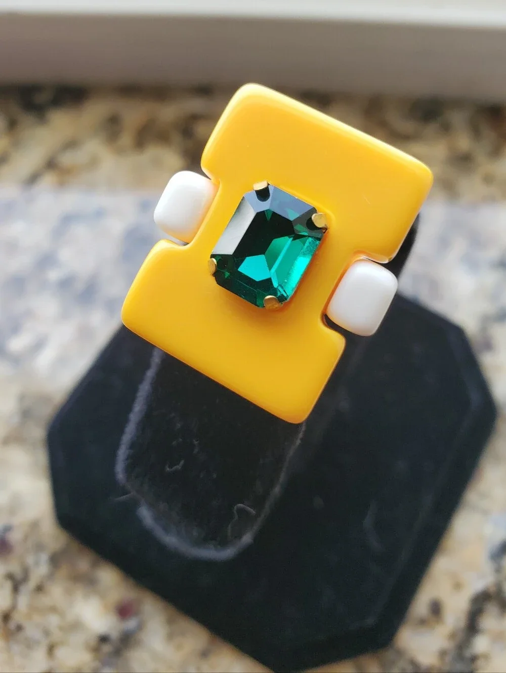 Bold Yellow Resin Ring with Emerald Green Stone